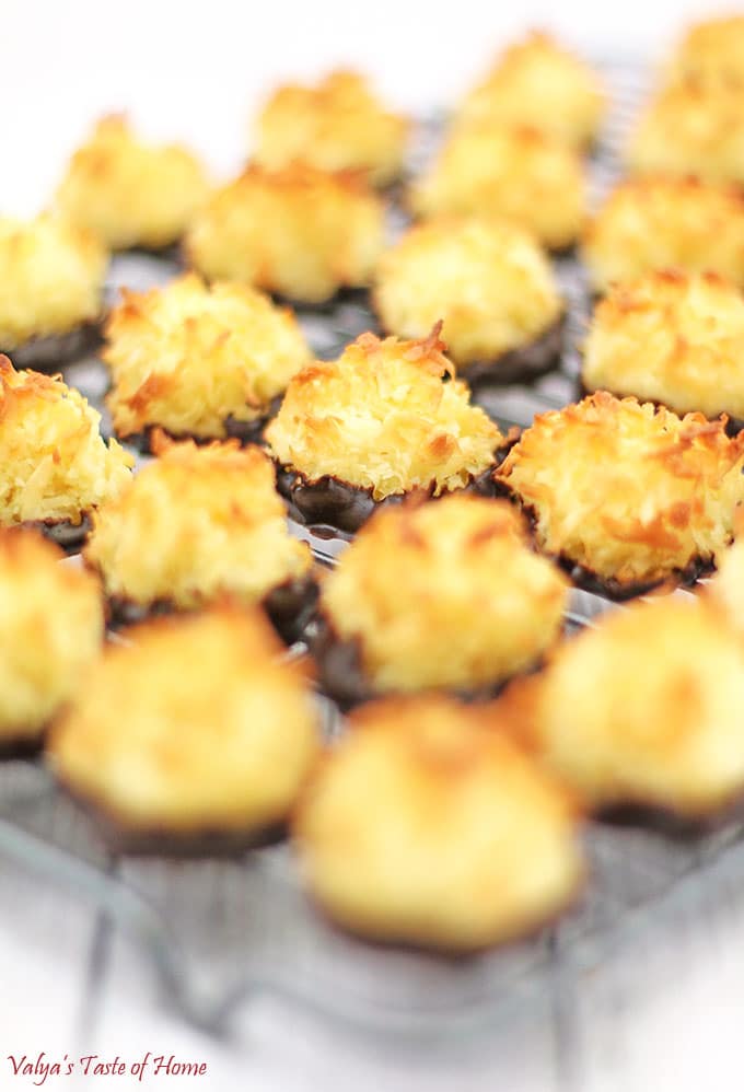 For all the coconut lovers out there, great news! These Chocolate Dipped Coconut Macaroons are deliciously packed all-coconut cookies you will love. It’s super easy to make, and perfect for students. You don’t even need fancy equipment; a simple hand mixer will do the job well! #coconutmacaroons #chocolatedippedcoconutmacaroons #cookies #valyastasteofhome