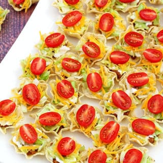 beautiful appetizers, cheddar cheese, Cinco de Mayo, decor appetizer, delicious appetizers, holiday food, kids aproved, kids love it, lettuce, mini cherry tomatoes, mini tacos, Taco Bites Appetizers