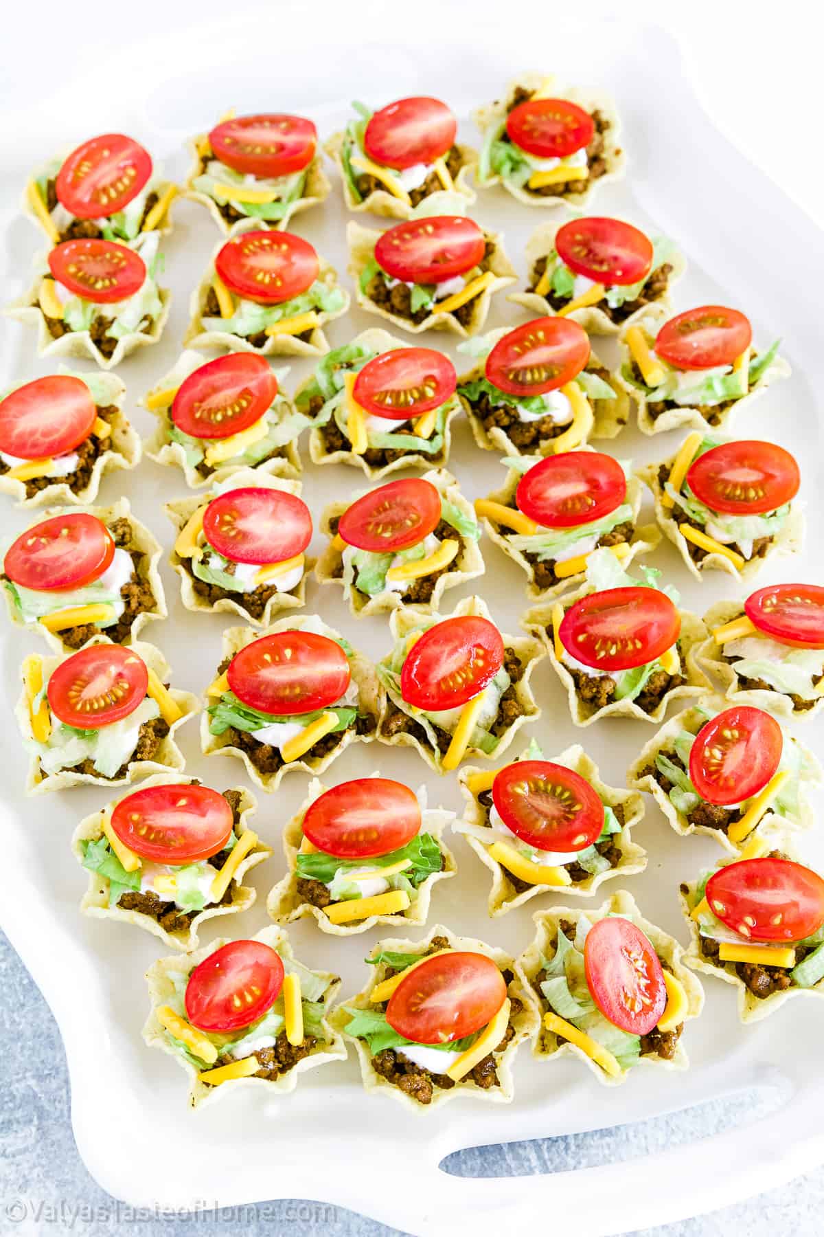What’s a great party snack that everyone will love? This taco bites appetizer recipe is quick, easy, customizable, and a hit with any crowd and especially kids!