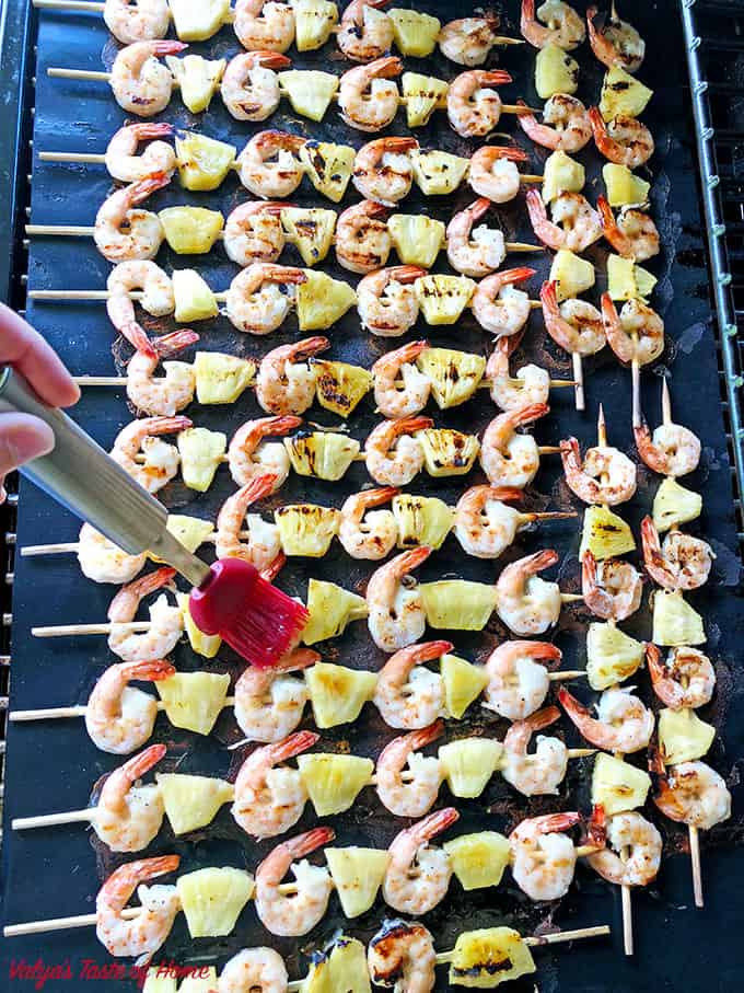 Use only half of the glaze amount and reserve the other half for the glazing on the other side of the skewers. 