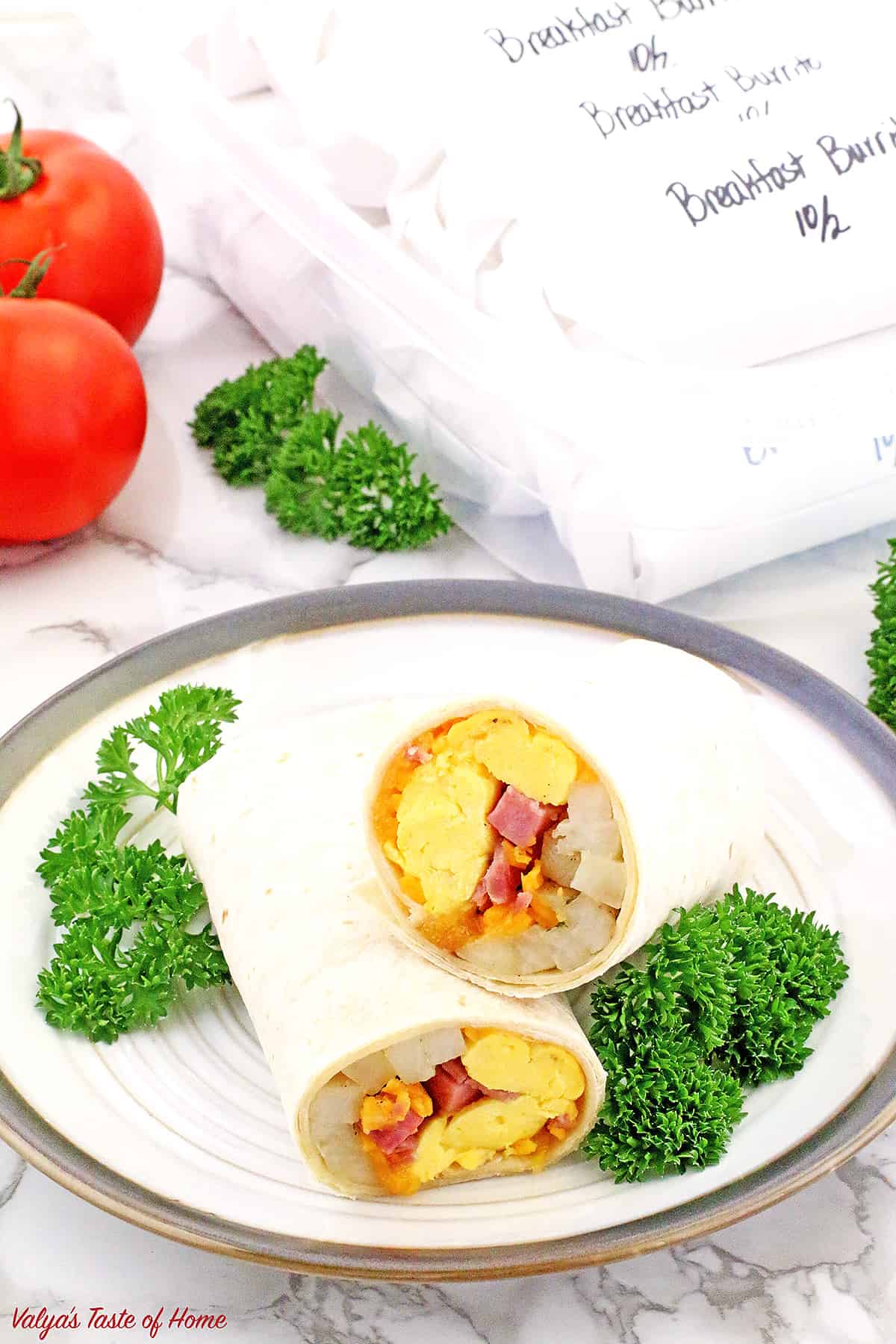 These Make-Ahead Breakfast Burritos are super easy to put together and brilliant for busy schedules. All the breakfast taste, zero-time spent cooking. It doesn't get any easier than this: reheat and eat!
