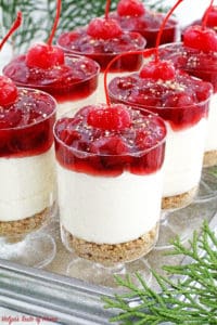 These No Bake​ Cherry Cheesecake Parfaits are not only beautiful, they are delicious, perfectly portioned décor dessert that is any party friendly.