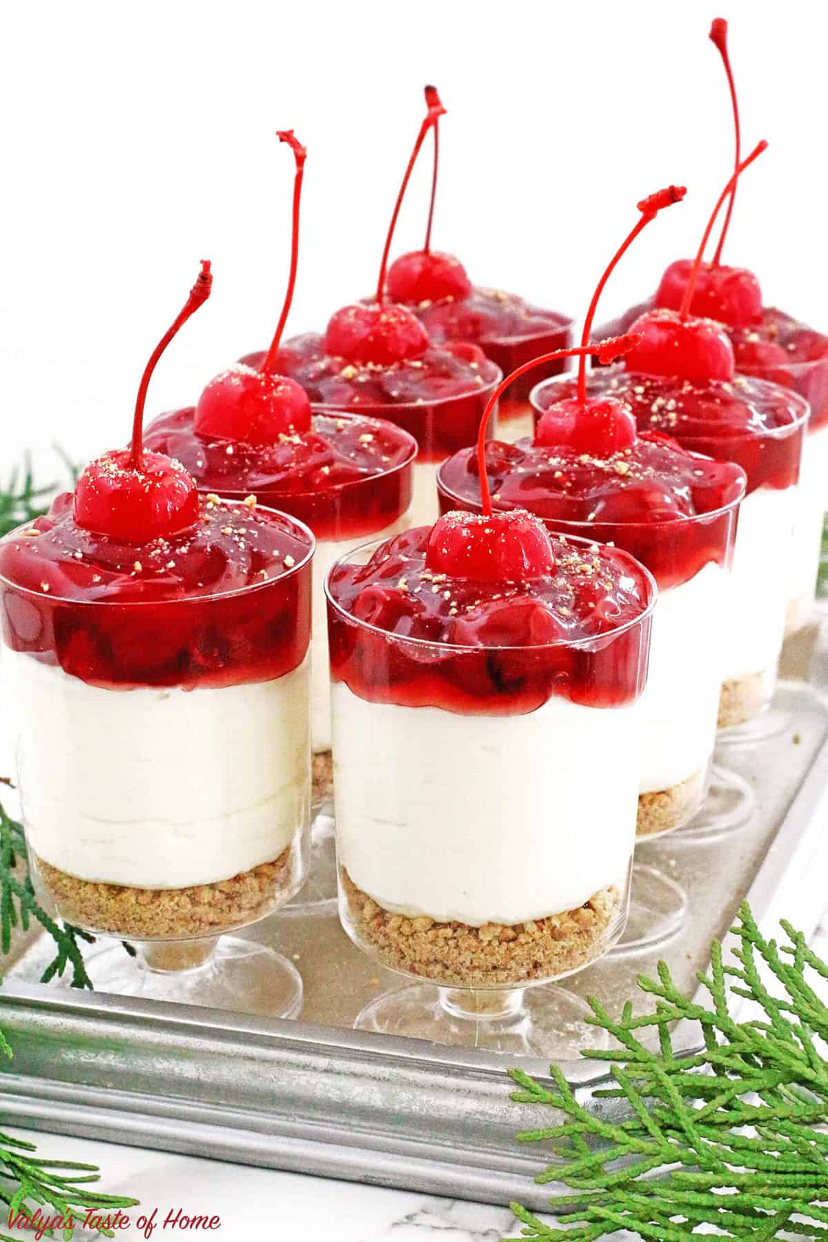 These beautiful, portion-controlled cheesecake parfaits are easy to make, holiday-ready, and have the perfect mix of sweet, tangy, and stunning tart cherry topping. They're guaranteed to be the showstopper at your next gathering.