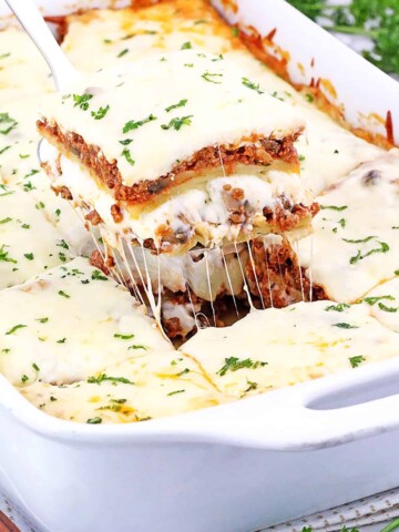 This Mushroom Lasagna features a delicious combination of mushroom and ground beef cooked in a tasty tomato-based sauce for a hearty, comforting dinner meal!