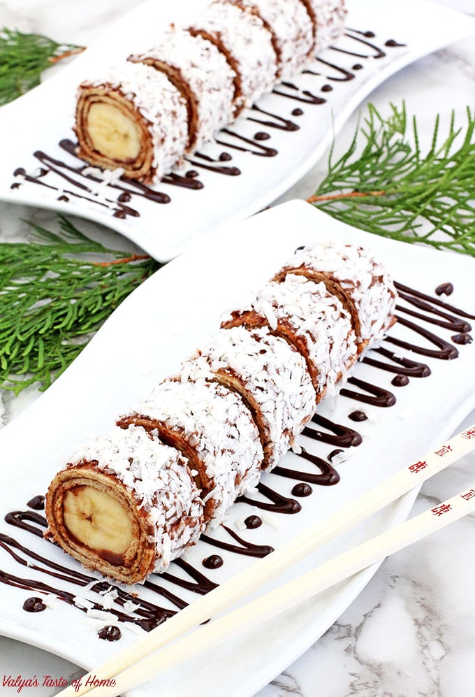 What can be better than sushi? Dessert sushi, folks! This Easy Banana Nutella Sushi Rolls require no baking and comes together in no time! A banana rolled in a honey tortilla, spread with Nutella, coated with coconut shaving make the best snack, and you’ve got an irresistibly legit pleaser on your hands. Sushi’s better half!