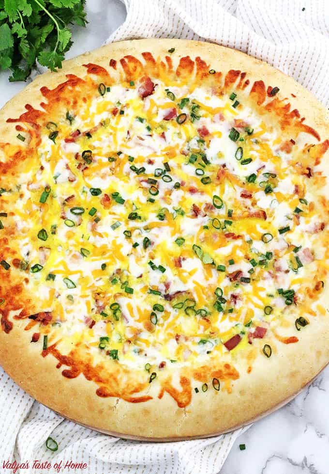 Not much can beat the taste of Bacon, Egg, and Ham Breakfast Pizza Recipe made from scratch for breakfast at my house! Soft homemade pizza dough topped with your favorite breakfast ingredients make it taste so good. Kids will look forward to waking up early knowing what’s on the menu, to enjoy the scrumptious slice of the cheese breakfast pizza. 