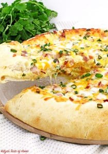 Nothing beats the taste of Bacon, Egg, and Ham Breakfast Pizza Recipe made from scratch! Soft homemade pizza dough topped with your favorite breakfast ingredients make it taste irresistible! You will be looking forward to waking up early knowing what’s on the menu for tomorrow, so you can enjoy the scrumptious slice of the cheese breakfast pizza.