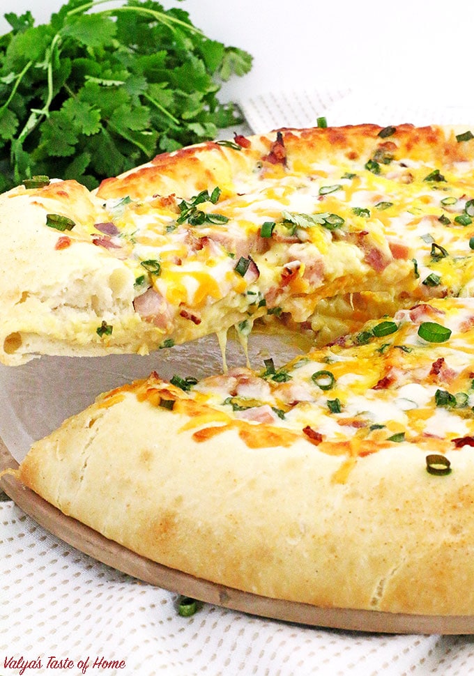 Not much can beat the taste of Bacon, Egg, and Ham Breakfast Pizza Recipe made from scratch for breakfast at my house! Soft homemade pizza dough topped with your favorite breakfast ingredients make it taste so good. Kids will look forward to waking up early knowing what’s on the menu, to enjoy the scrumptious slice of the cheese breakfast pizza.
