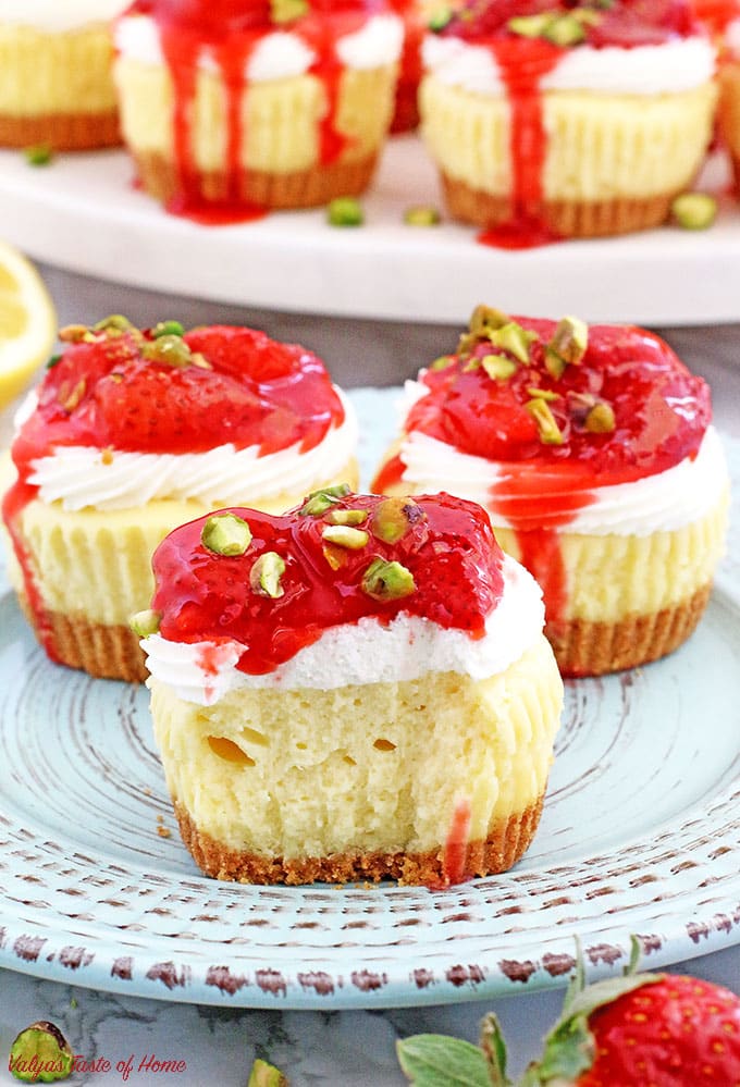 These Mini Strawberry Cheesecakes are made of a buttery graham cracker crust, the tastiest cheesecake filling, and chunky strawberry sauce.