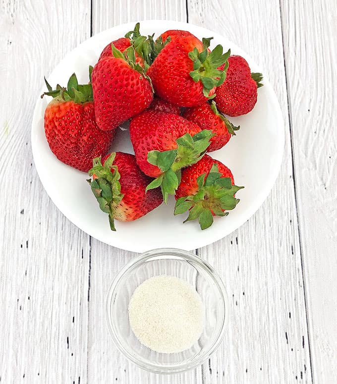 This Strawberry Vanilla Swiss Roll Recipe is the easiest and the quickest dessert you can ever make! Supper soft sponge cake topped with amazingly tasty (no cook) strawberry sauce, filled with super soft and fluffy cream, dusted with confectioners’ sugar and topped with loads of fresh strawberries.