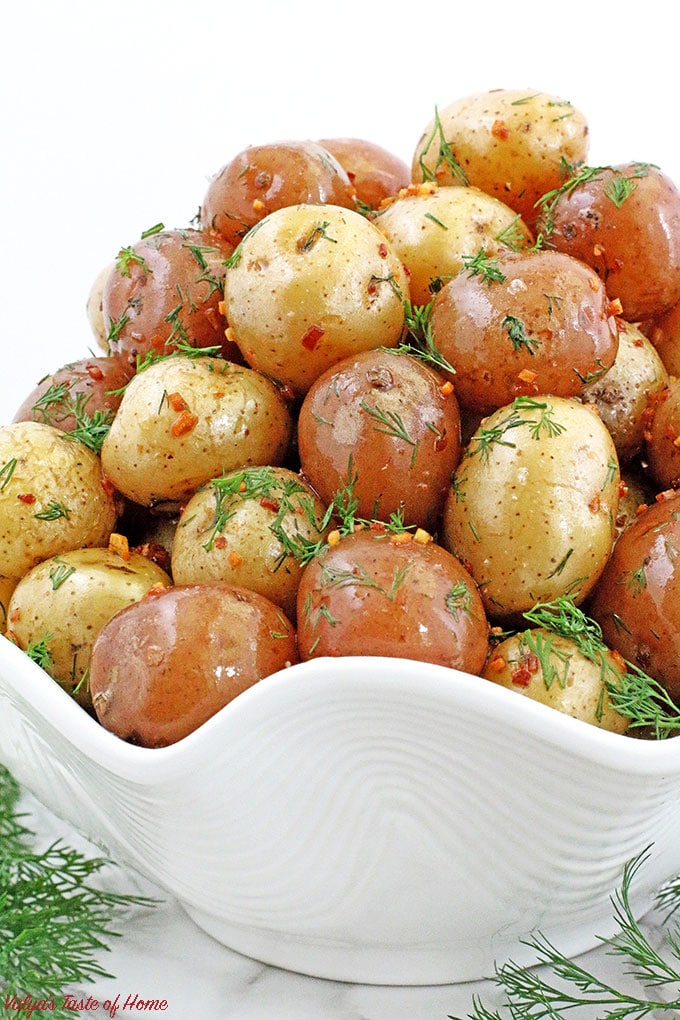 These potatoes are creamy and tender on the inside, and crispy on the outside. Flavored with garlic butter and dill for the tastiest potatoes!