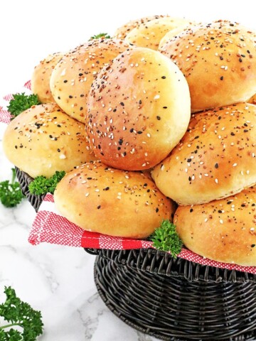 This Pillow Soft Burger Buns Recipe is the only recipe you’ll ever need. These homemade buns are pillow-like soft, tender, rich, so flavorful and perfect for a big juicy burger! Your mixer will do most of the work for. Then all it takes is to shape and bake! You will surprise your family on a burger night, or your guest at your next backyard get-together how tasty they are!
