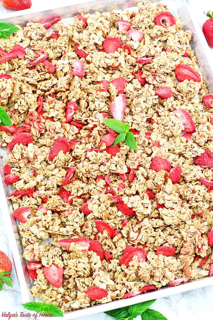 The title says it all! This Easy Strawberry Almond Granola Recipe is truly super easy and quick to make! It's so much healthier, cleaner, and tastier when made at home than a store bought. But seriously, what is there not to love about this granola when almonds and strawberries pair so well together! ;)