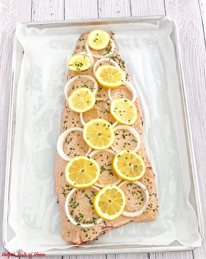 This Lemon Pepper Baked Salmon delicacy is the softest and juiciest baked salmon I've ever had. It bursts with flavor and is absolutely scrumptious. You will have seconds for sure! We usually serve this salmon with mashed potatoes and gravy, as kids like it.
