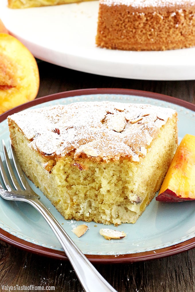 Who can resist a slice of this absolutely scrumptious Almond Peach Coffee Cake? It's light, fluffy, airy, moist, and loaded with peaches. The aroma of almond extract is phenomenal! Then topped and toasted almond slivers, making this cake not only beautiful but gives it a boost in taste as well.  Every bite just melts in your mouth. 