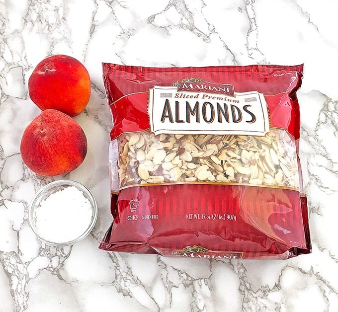 Who can resist a slice of this absolutely scrumptious Almond Peach Coffee Cake? It's light, fluffy, airy, moist, and loaded with peaches. The aroma of almond extract is phenomenal! Then topped and toasted almond slivers, making this cake not only beautiful but gives it a boost in taste as well. Every bite just melts in your mouth.