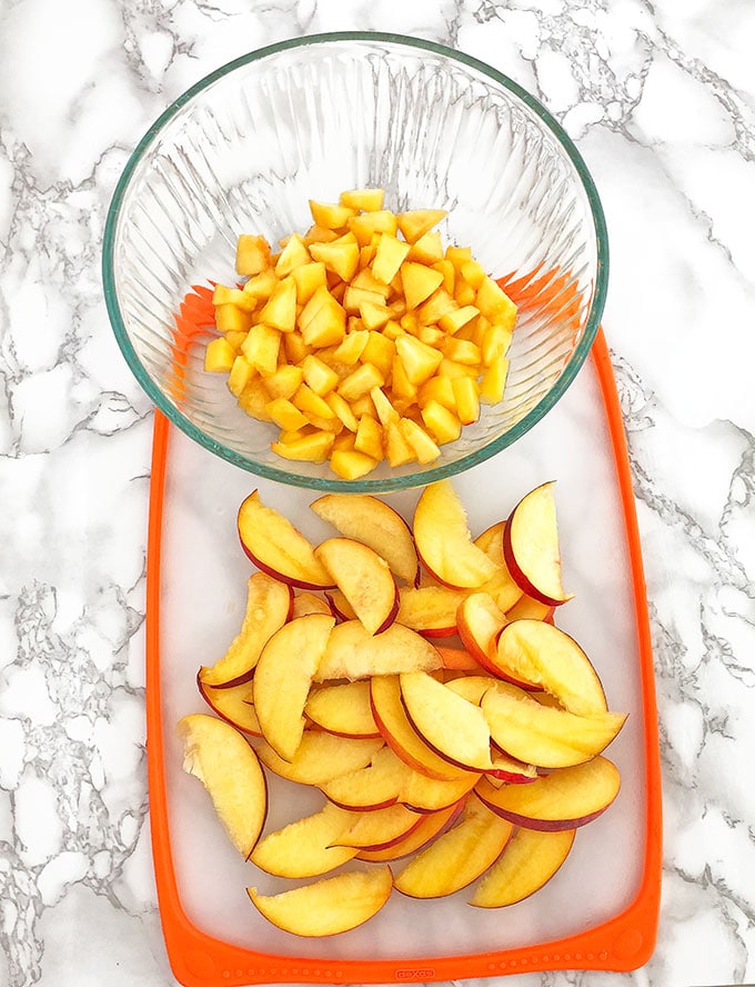 Who can resist a slice of this absolutely scrumptious Almond Peach Coffee Cake? It's light, fluffy, airy, moist, and loaded with peaches. The aroma of almond extract is phenomenal! Then topped and toasted almond slivers, making this cake not only beautiful but gives it a boost in taste as well.  Every bite just melts in your mouth. 