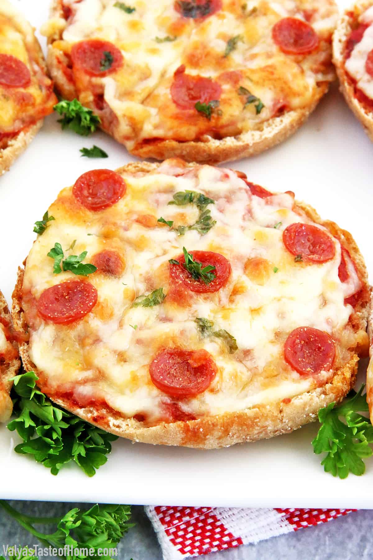 These English Muffin Mini Pepperoni Pizzas is a great project for the kiddos. It takes just a few basic ingredients, but the little ones love making them. They feel like they cooked their own pizza! #cookingwithkids #minipizzas #englishmuffinminipizzas #valyastateofhome