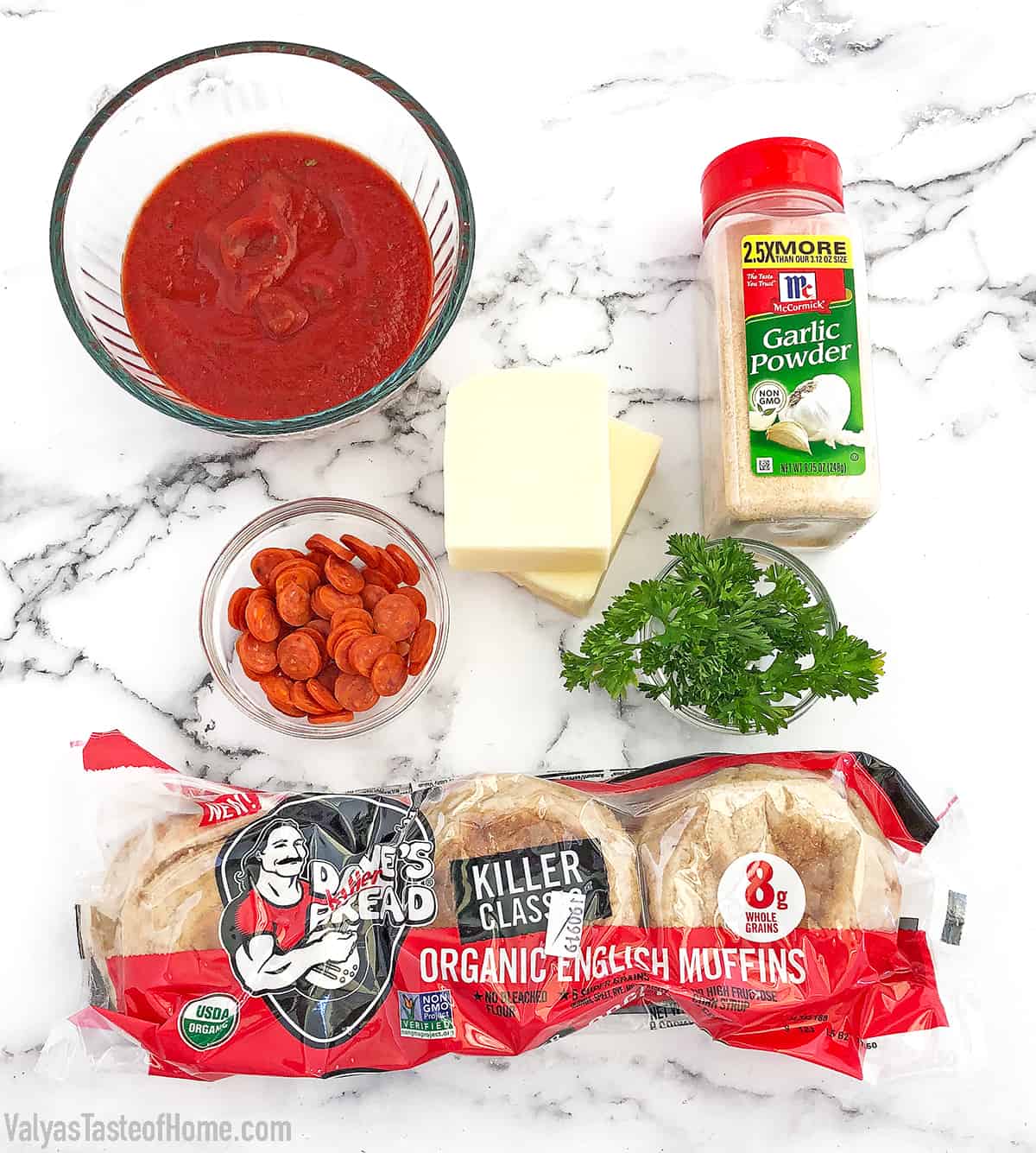 These English Muffin Mini Pepperoni Pizzas is a great project for the kiddos. It takes just a few basic ingredients, but the little ones love making them. They feel like they cooked their own pizza! #cookingwithkids #minipizzas #englishmuffinminipizzas #valyastateofhome