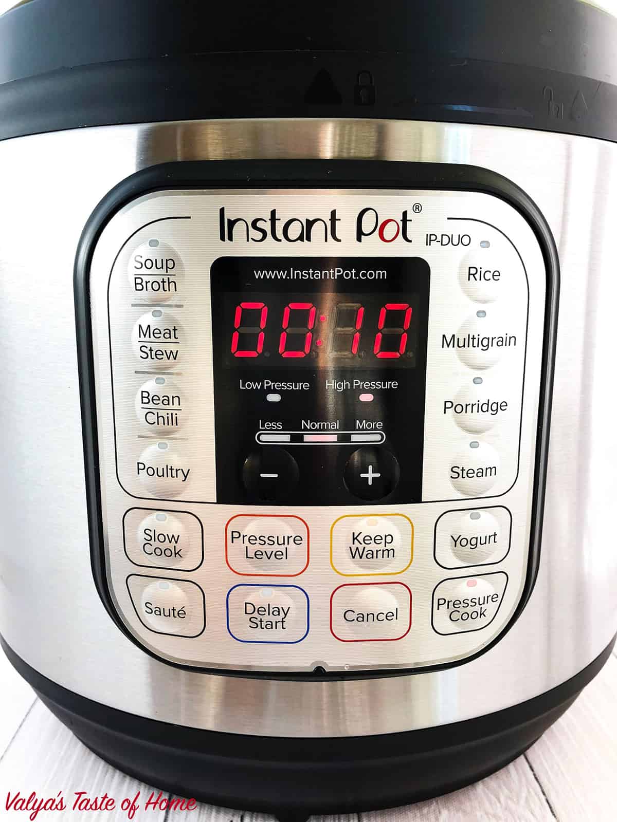 Close the instant pot lid, and turn the valve to 'Sealing'. Click on the 'Pressure Cook' button and set the cooking time to 10 minutes.