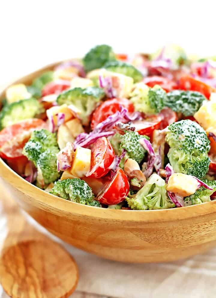 This Creamy Cheddar Broccoli and Tomato Salad Recipe is a great addition to your holiday feast or any occasion at any time of the year.