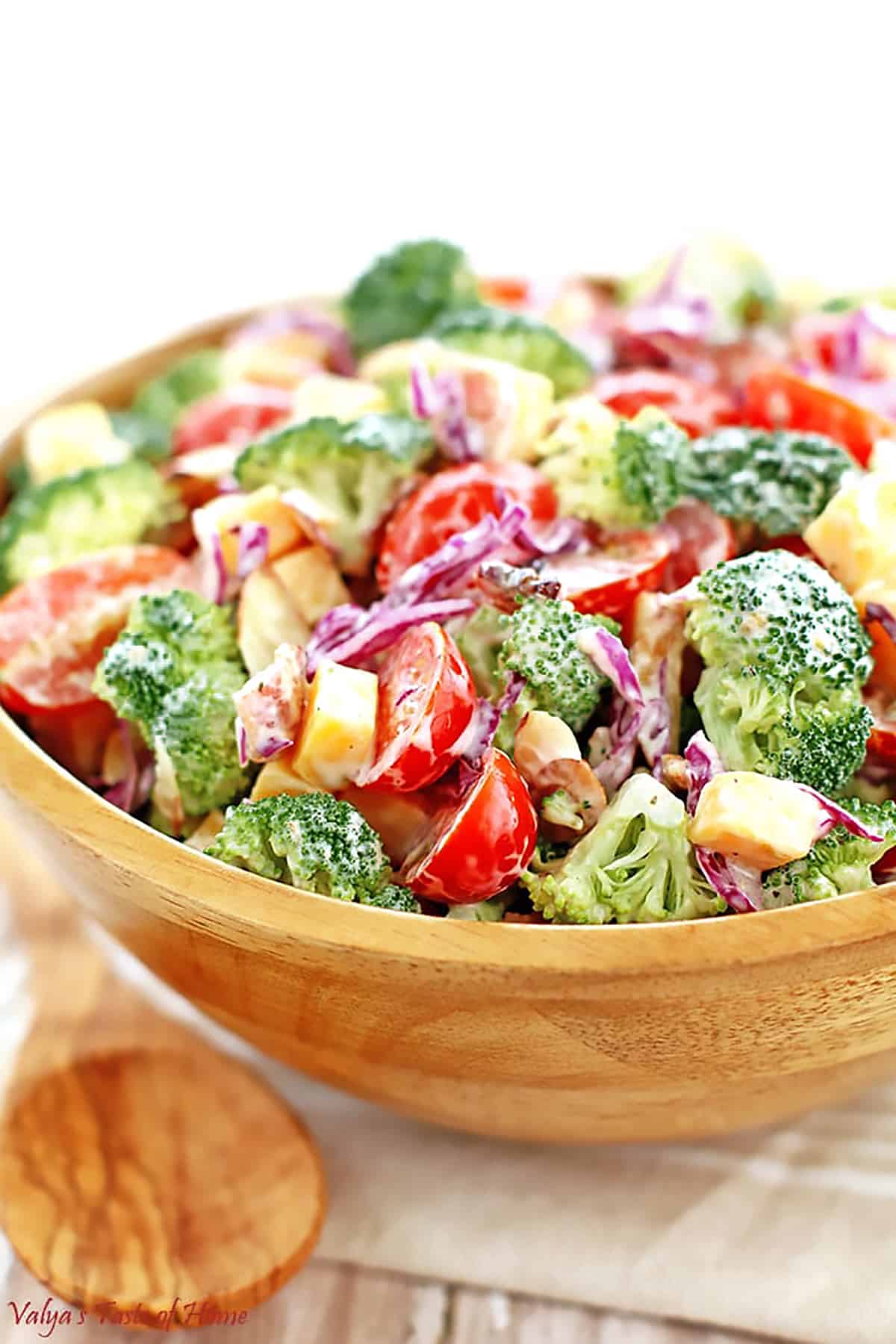 This Creamy Cheddar Broccoli and Tomato Salad Recipe is a great addition to your holiday feast or any occasion at any time of the year.