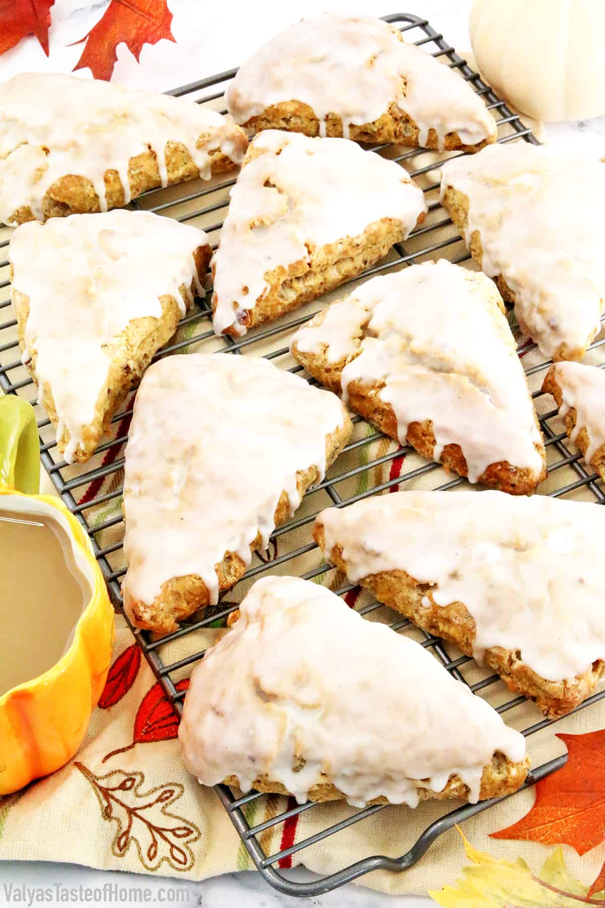 These Glazed Pumpkin Pecan Scones are soft, flaky, buttery, and bursting with cinnamon and pumpkin flavors. They are super simple to make but very delicious fall treat that is so much loved in my family. #pumpkinscones #glazedpumpkinpecanscones #breakfast #easyrecipe #valyastasteofhome