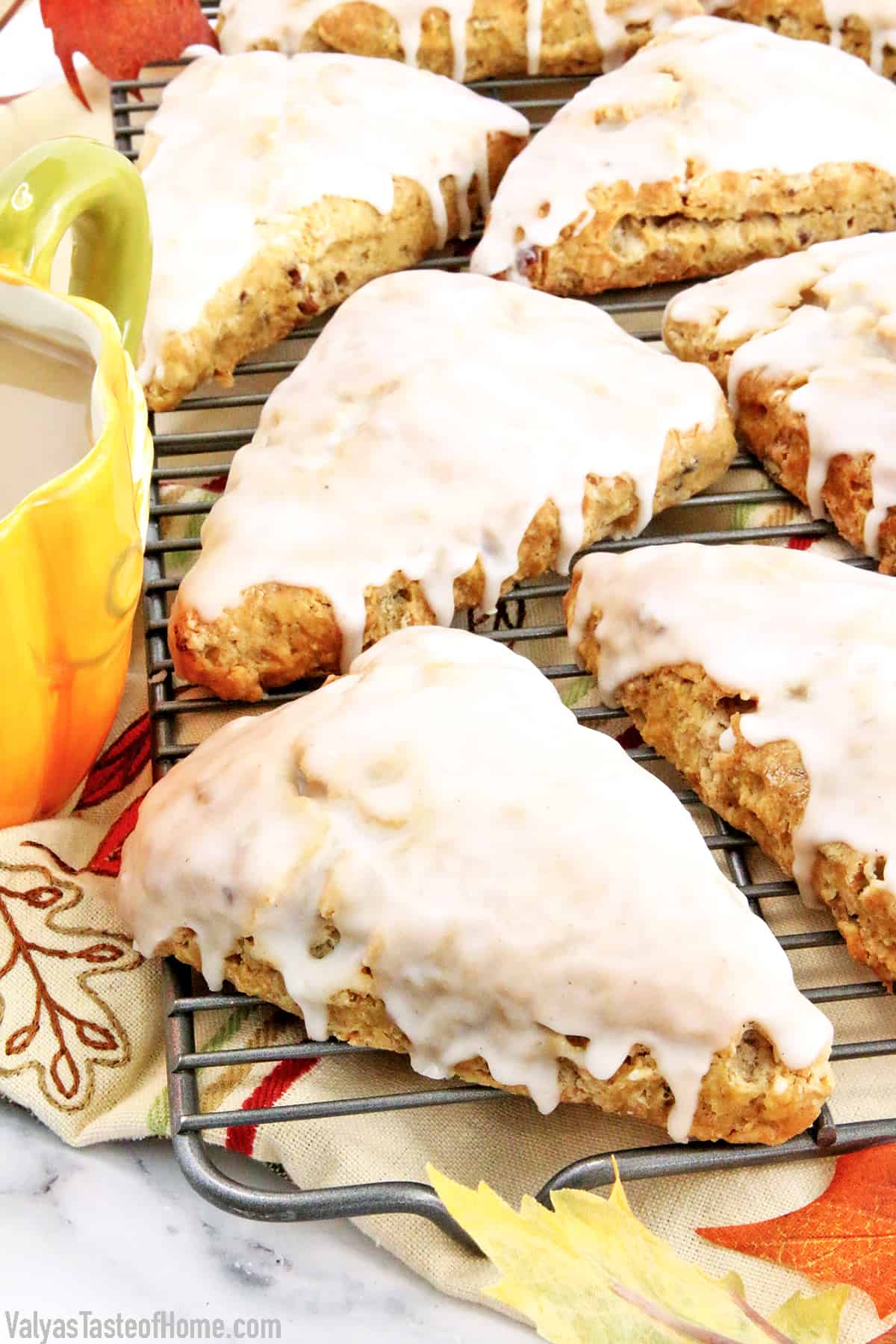 These Glazed Pumpkin Pecan Scones are soft, flaky, buttery, and bursting with cinnamon and pumpkin flavors. They are super simple to make but very delicious fall treat that is so much loved in my family. #pumpkinscones #glazedpumpkinpecanscones #breakfast #easyrecipe #valyastasteofhome