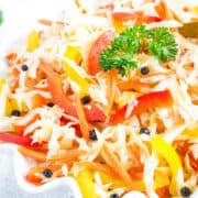 This recipe brings together the classic combination of cabbage and carrots, enhanced by the tangy marinade. It's a timeless favorite.