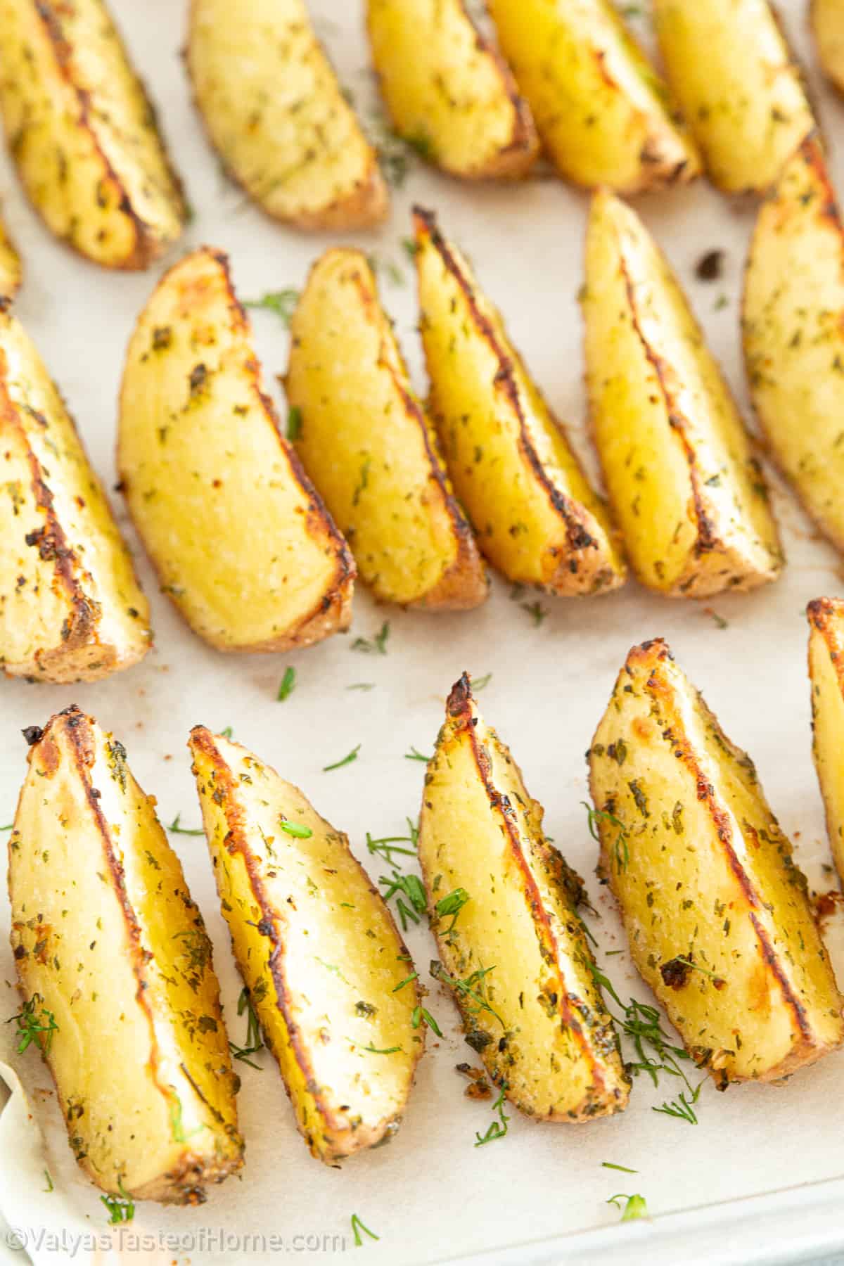 Baked Potato Wedges are a great way to get your potato fix without all the fat and calories of deep-fried potatoes.