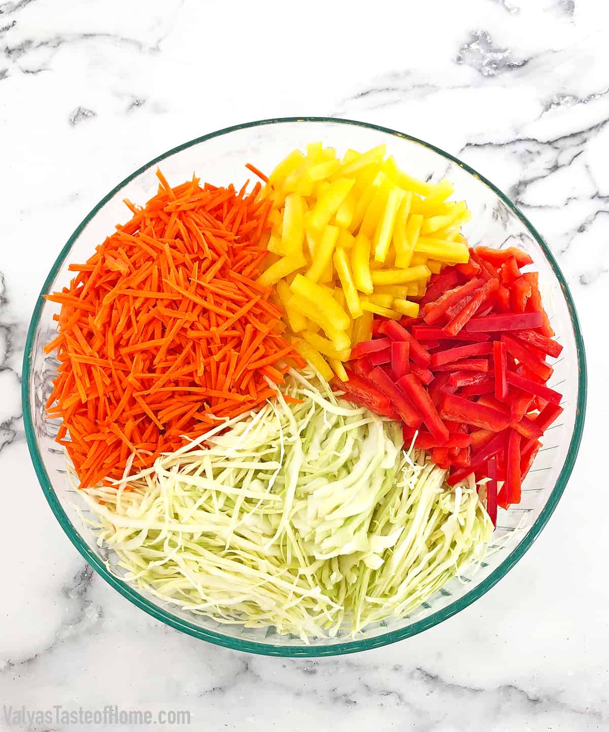 This Cabbage Carrots and Peppers Salad recipe is not one of those salads that you really taste the sharpness of fresh vegetables. It tastes more like a marinated salad and has a bit of a sweet and sour taste to it. The best thing I like about this salad is that you can make it ahead of time which helps avoid those last-minute preparation rushes.  #cabbagecarrotspepperssalad #marinatedsalad #easymarinatedvegetablesalad #valyastasteofhome