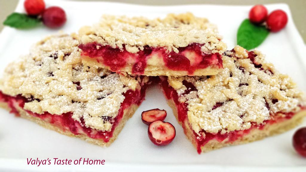 There's no treat like cranberries for Christmas! Couple that with sweet cream cheese and you've really got something delicious. Another great treat just in time for the Holidays. These Cream Cheese Cranberry Bars are very easy to make and are absolutely delightful! #cranberrybars #creamcheesecranberrybars #holidaybaking #valyastasteofhome