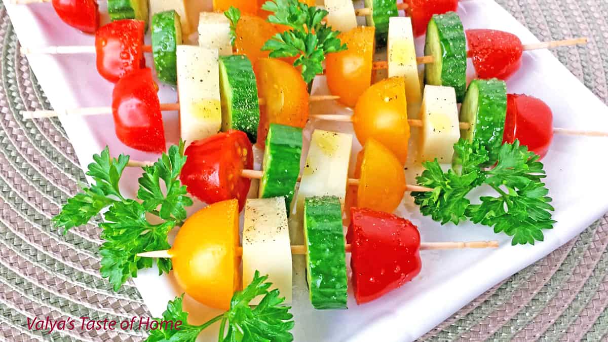 This delightful Tomato Cucumber and Mozzarella Cheese Kabob Appetizers seasoned with salt and pepper and drizzled in olive oil are so easy to make and tastes absolutely tasty.