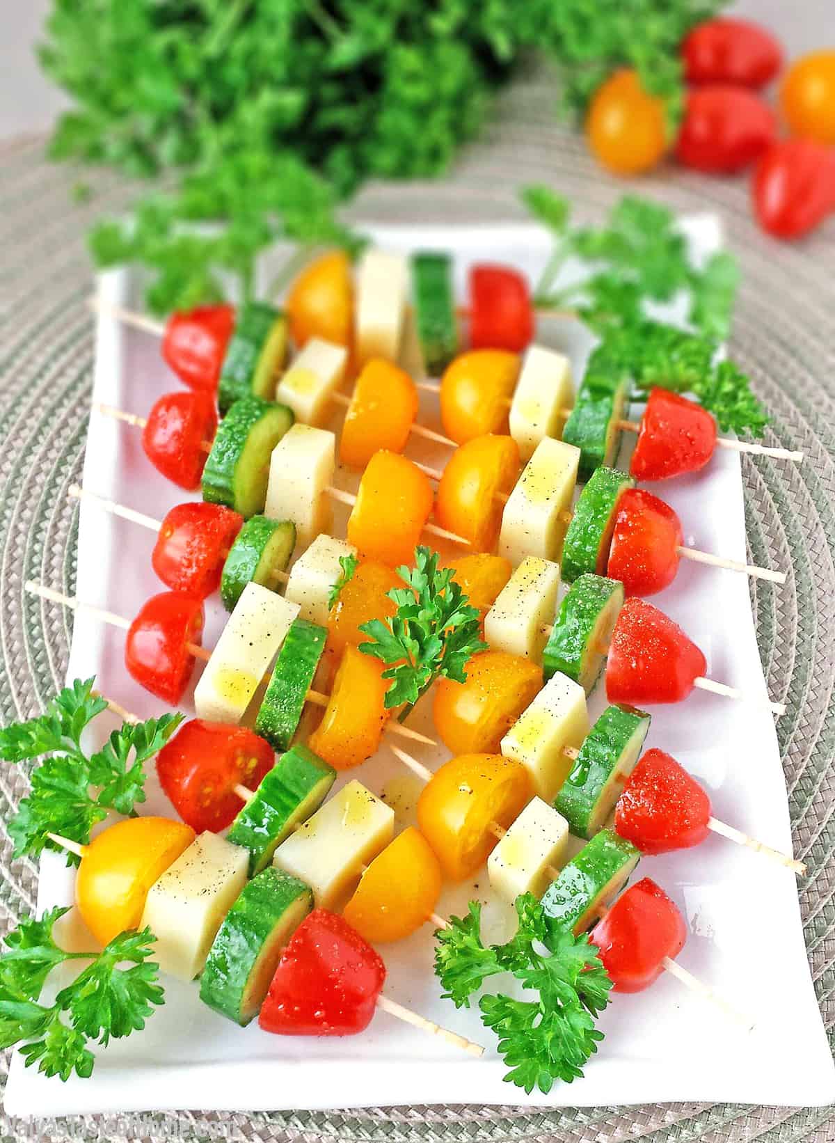 This delightful Tomato Cucumber and Mozzarella Cheese Kabob Appetizers seasoned with salt and pepper and drizzled in olive oil are so easy to make and tastes absolutely tasty.