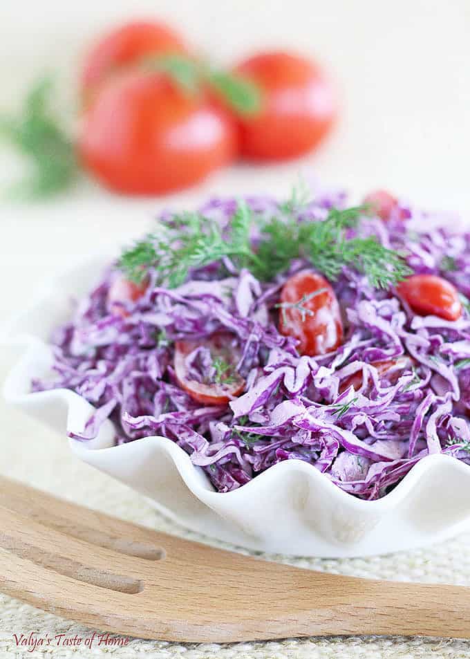 This Purple Cabbage Tomato Salad, like most, has its own distinct taste and deliciousness which I really like. It's easy to make and requires very few ingredients. The plain Greek Yogurt and mayonnaise dressing combo give it a rich, smooth and healthy flavor and texture.