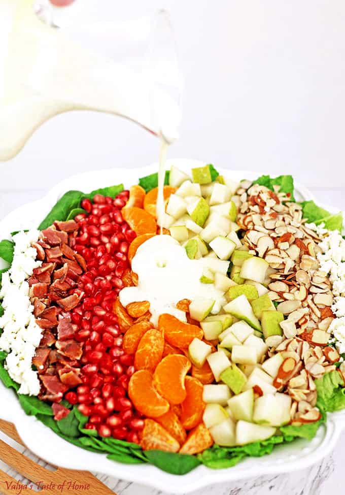 This bright and colorful Pear, Pomegranate, Mandarin Winter Salad with Homemade Ranch Dressing and some of the winter harvested fruit is so scrumptious! #wintersaladrecipe #homemaderanch #valyastasteofhome