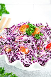 This Purple Cabbage Salad is a colorful and flavorful dish that's perfect as a refreshing and healthy meal.