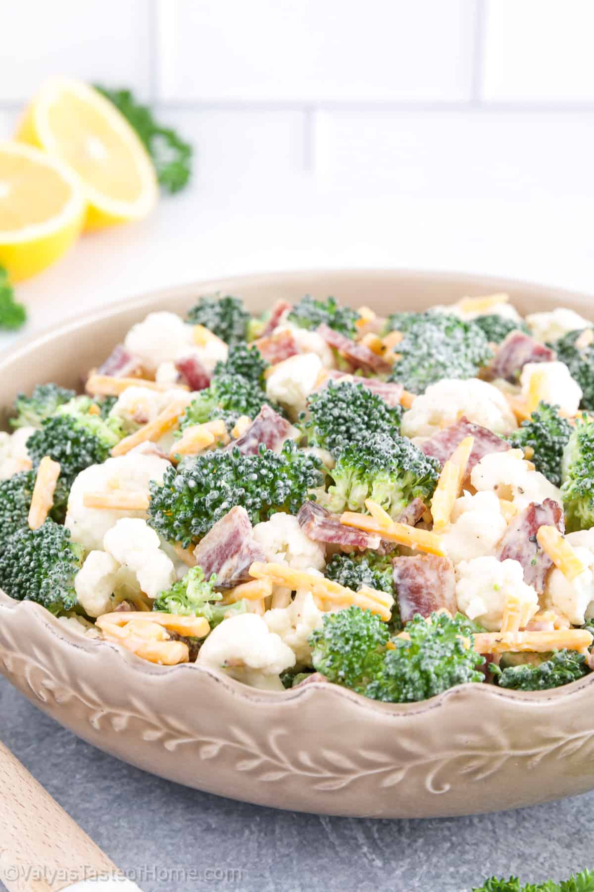 This Broccoli Cauliflower Salad recipe features tasty broccoli, creamy cauliflower, and crunchy bacon for a mouthwatering flavor you'll absolutely love!