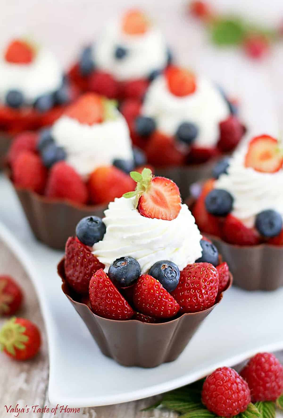These Fruit Chocolate Cups with fresh berries, chocolate pudding, and cream are incredible little desserts that not only look elegant but taste delicious too!