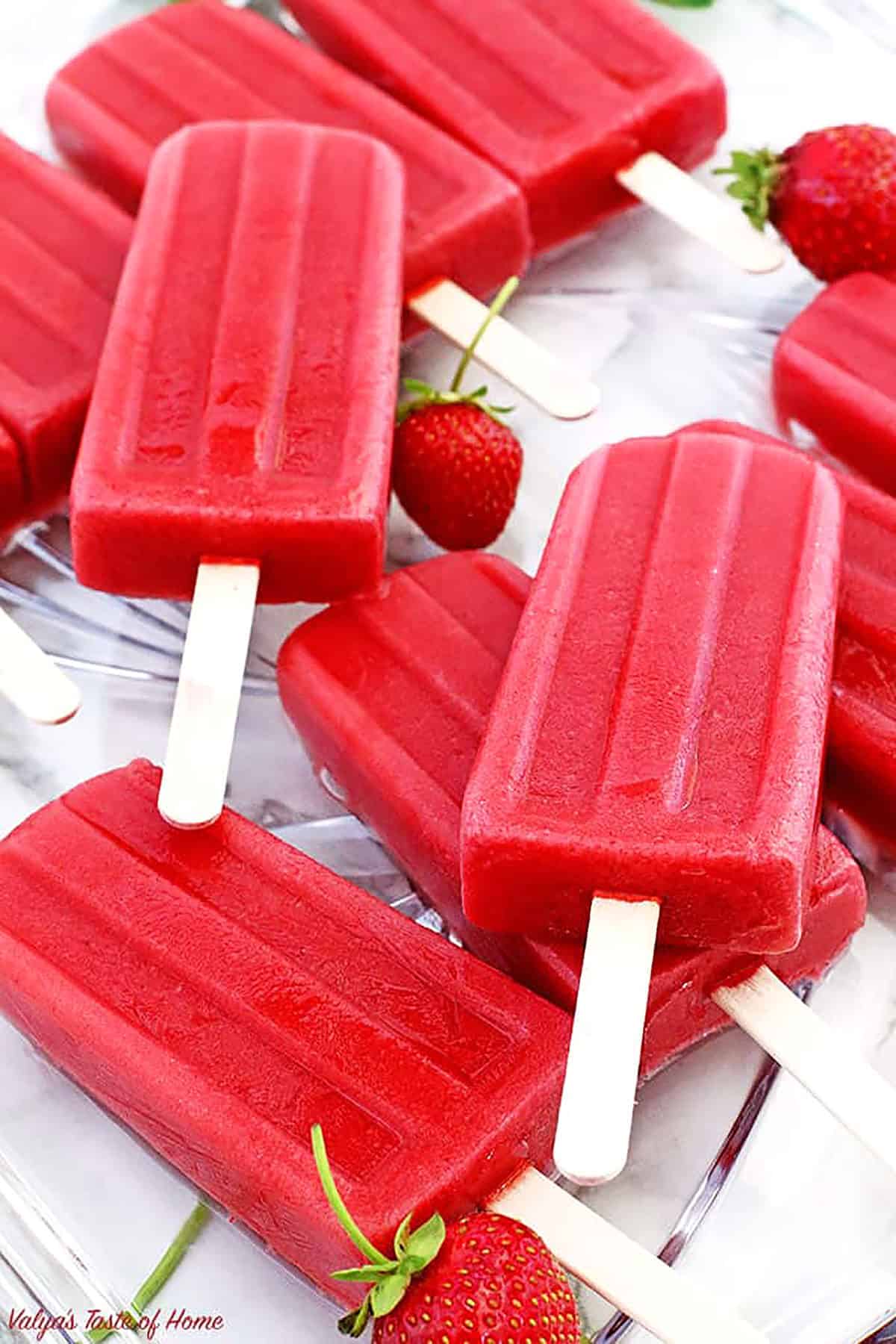 If you love popsicles, I have the perfect recipe for you! These homemade Strawberries Popsicles are naturally sweet, free of any refined sugar, and loaded with a delicious fresh strawberry flavor in each bite!
