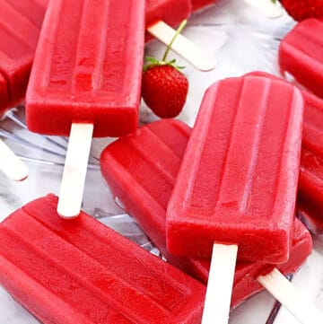 If you love popsicles, I have the perfect recipe for you! These homemade Strawberries Popsicles are naturally sweet, free of any refined sugar, and loaded with a delicious fresh strawberry flavor in each bite!