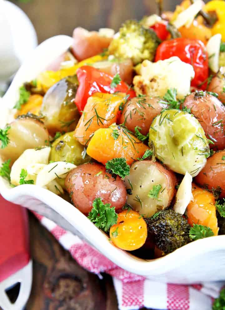 The name says it all! When I say simple, it is effortless, with just a few ingredients. This Simple Roasted Mixed Veggie Recipe is really healthy and nutritious. It's one of those recipes that you can just throw all the ingredients into a bowl, add seasoning to taste, bake, and enjoy!