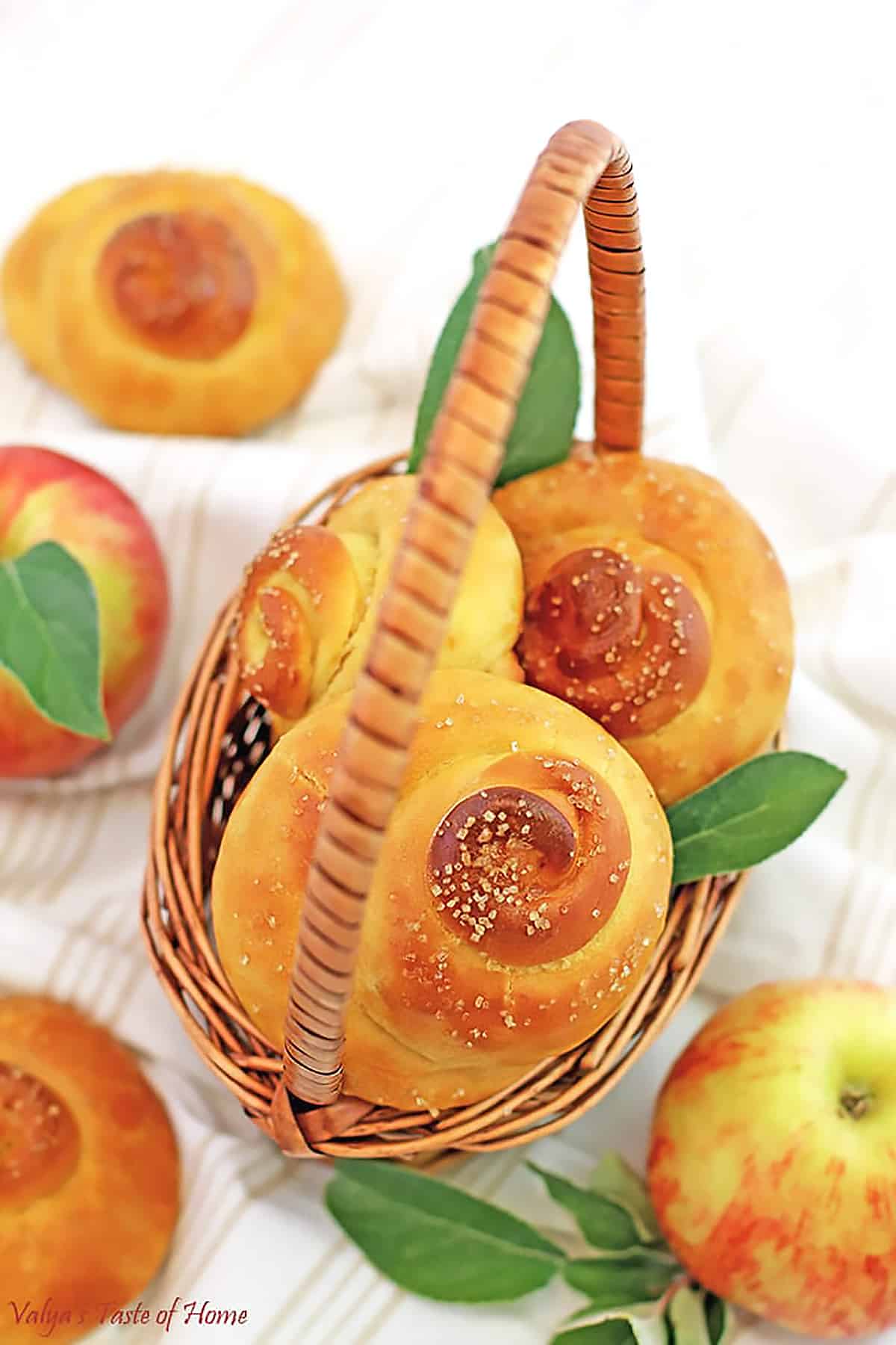 Ah, the sweet flavors of fall! These super-soft, Sweet Swirl Apple Buns are a wonderful comfort fall treat. The juicy grated apples make them incredibly moist, delicious, and irresistible! They look so beautiful and glossy after being brushed with the egg glaze and sprinkled with organic raw sugar. You just wanna eat them raw, like cookie dough! ;)