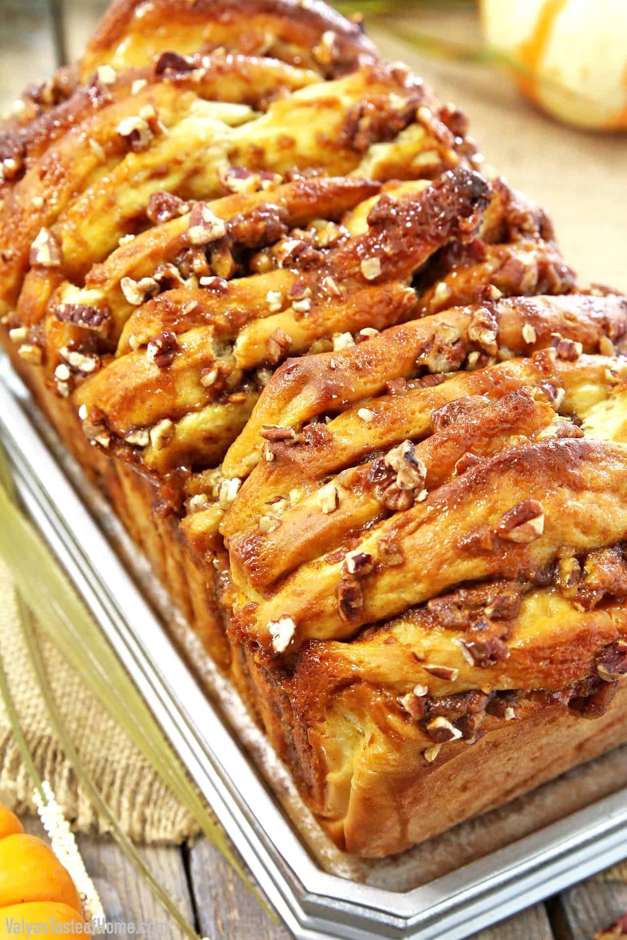 The name of this treat, Pumpkin Pull-Apart Bread with Pecans and Caramel, pretty much covers it! Filled with wonderful flavors we all love about Fall, it’s sure to satisfy your sweet cravings.