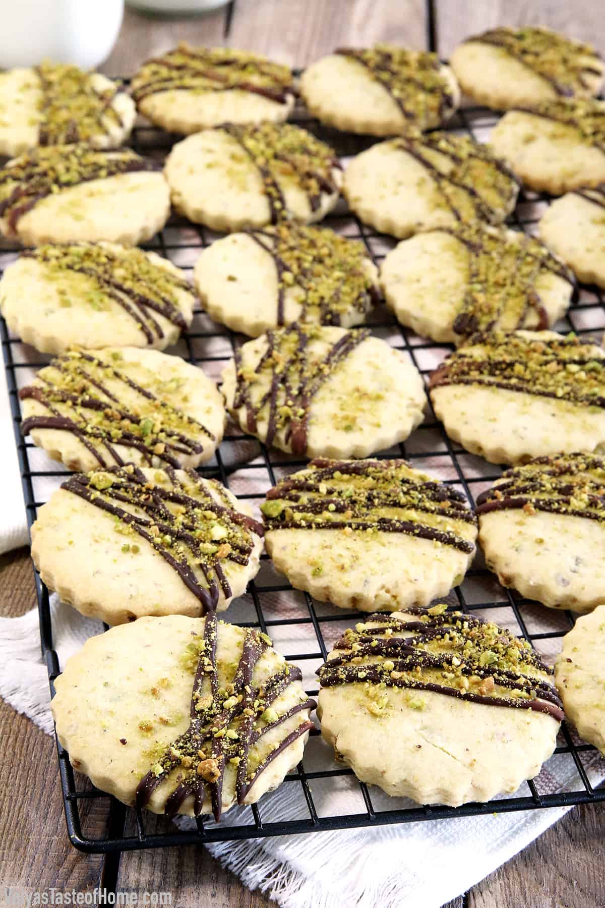 Move over chocolate chip cookies, these delicious cookies may just become a new favorite. What goes great with a treat like these Easy Pistachio Dark Chocolate Drizzle Shortbread Cookies? You're right, cold milk!