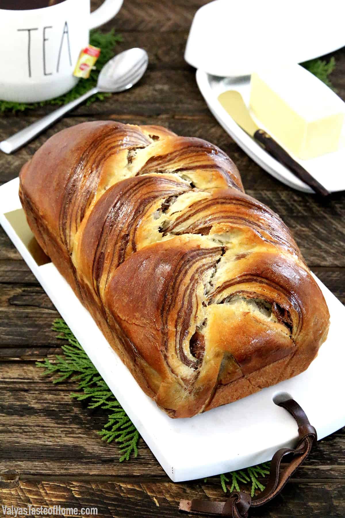 This Easy Soft and Fluffy Sweet Marbled Bread Recipe feature alluring swirls of vanilla and chocolate. Although it may look dizzyingly complicated it is actually super easy to make. Airy, light, and sweet aromatic bread, each slice with its own uniquely gorgeous design that looks hard to believe it's actually edible.
