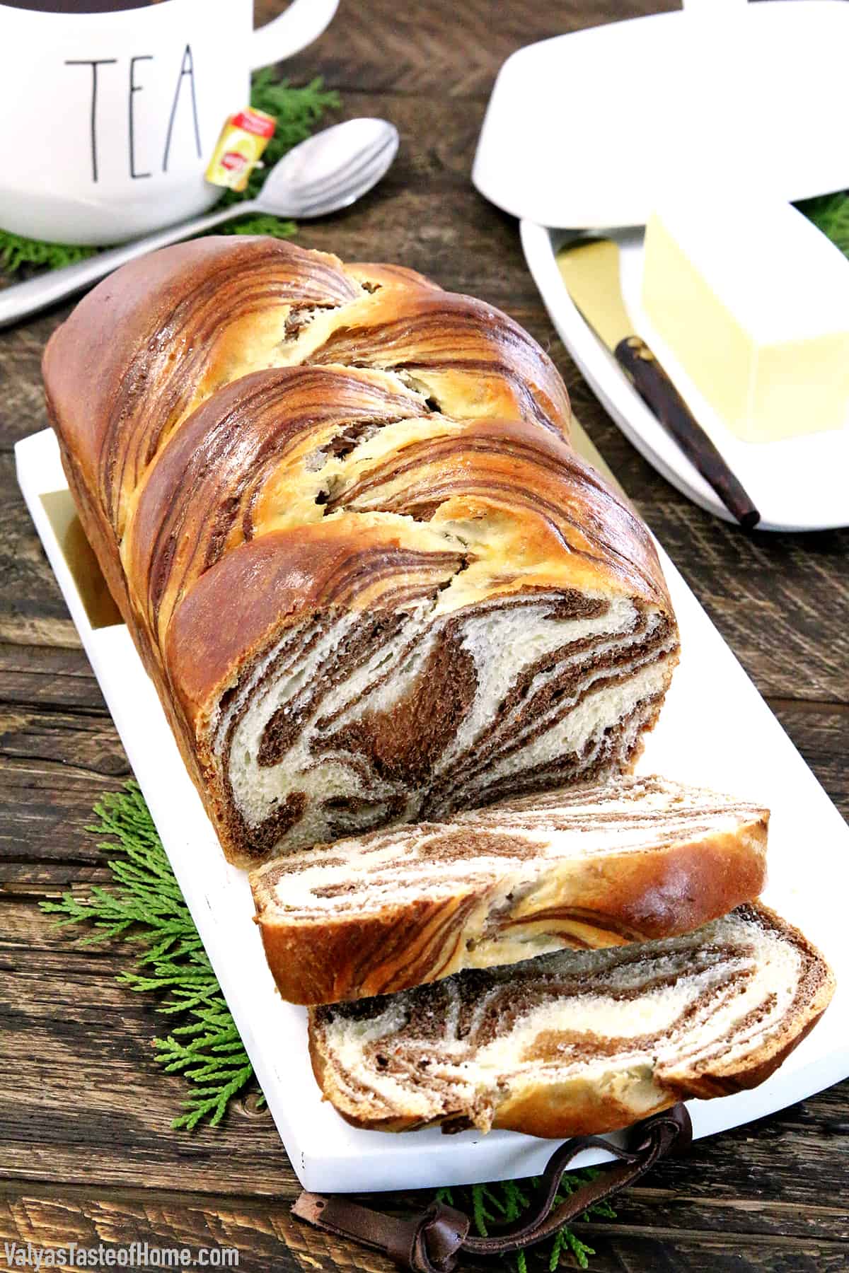 This Easy Soft and Fluffy Sweet Marbled Bread Recipe feature alluring swirls of vanilla and chocolate. Although it may look dizzyingly complicated it is actually super easy to make. Airy, light, and sweet aromatic bread, each slice with its own uniquely gorgeous design that looks hard to believe it's actually edible.