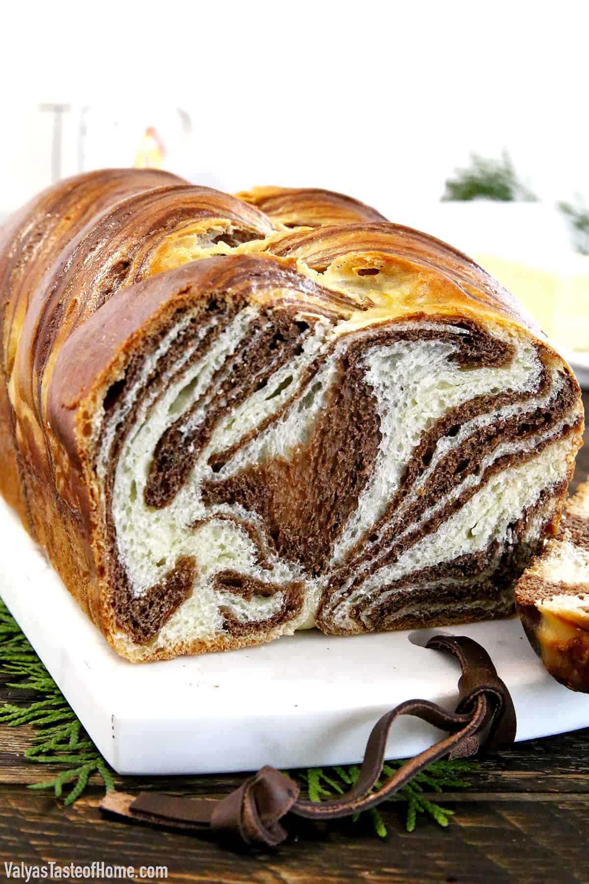 This Easy Soft and Fluffy Sweet Marbled Bread Recipe feature alluring swirls of vanilla and chocolate. Although it may look dizzyingly complicated it is actually super easy to make. Airy, light, and sweet aromatic bread, each slice with its own uniquely gorgeous design that looks hard to believe it's actually edible.