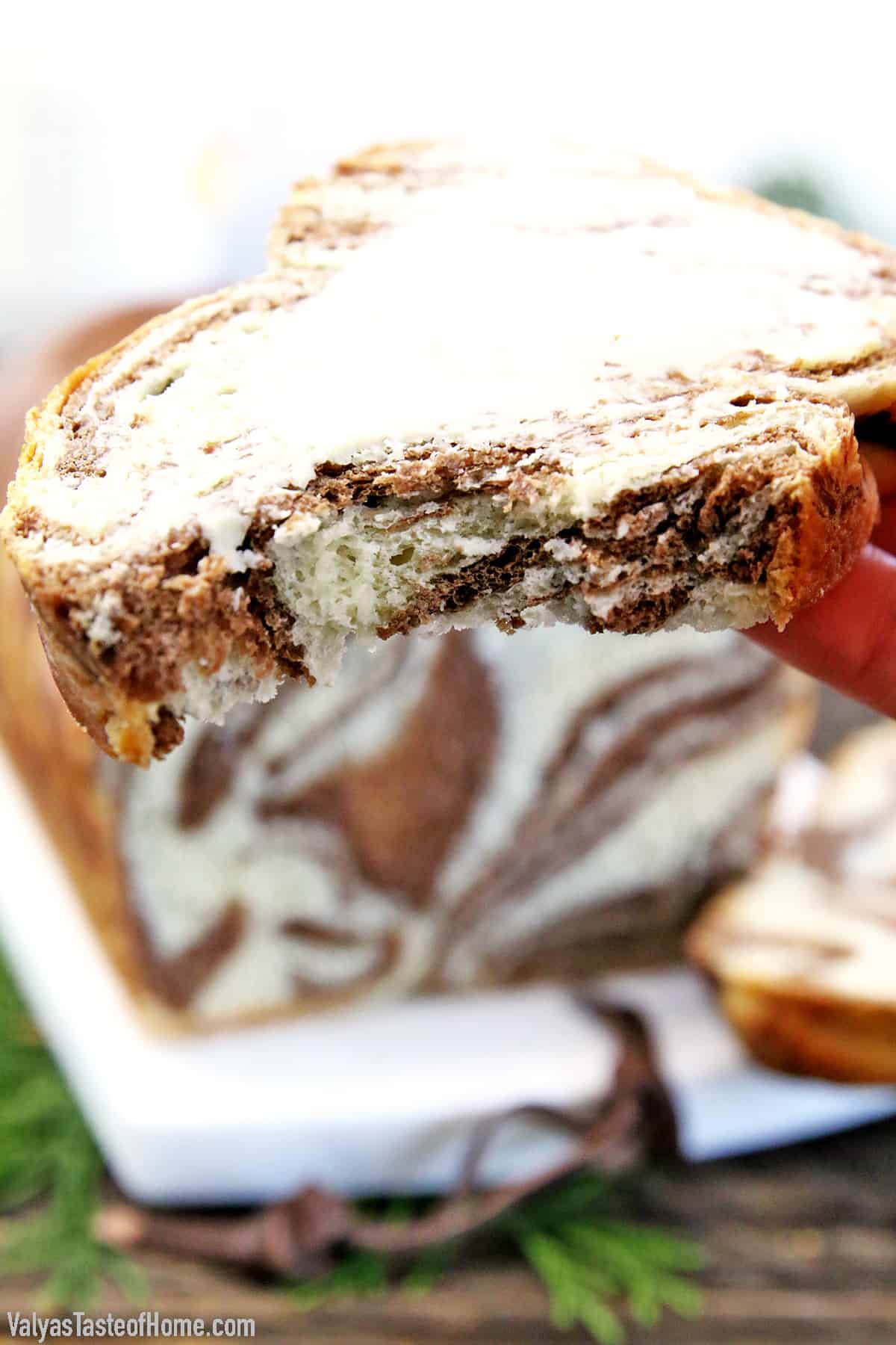 This Easy Soft and Fluffy Sweet Marbled Bread Recipe feature alluring swirls of vanilla and chocolate. Although it may look dizzyingly complicated it is actually super easy to make. Airy, light, and sweet aromatic bread, each slice with its own uniquely gorgeous design that looks hard to believe it's actually edible.