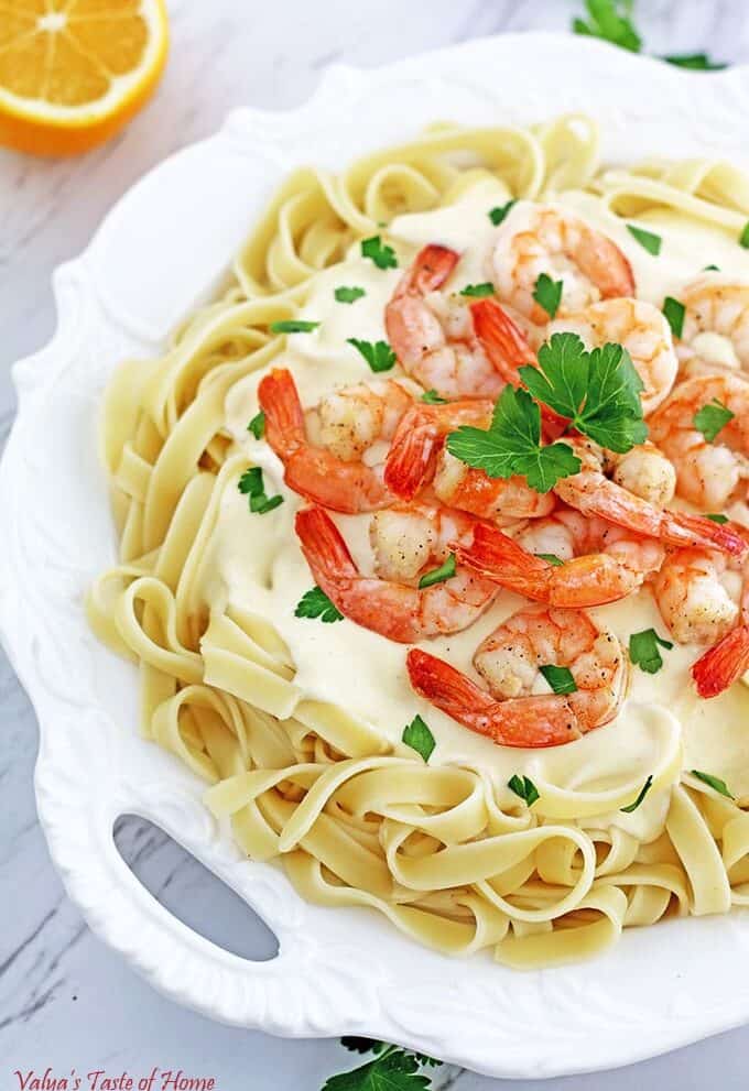 This Shrimp Alfredo Fettuccine Pasta Recipe is a majorly delightful crowd-gathering meal. And surprisingly not very long to make for how scrumptious and satisfying the meal is.